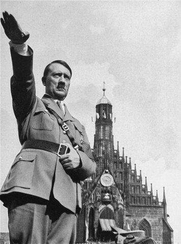 Hitler proclaims himself Führer und Reichskanzler (Leader and Reich Chancellor).