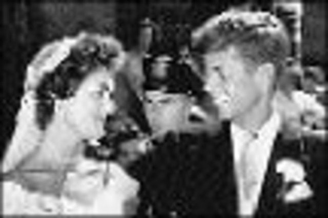 Marries Jacqueline Lee Bouvier in Newport, R.I.