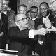 Lbj civil rights act with dr king