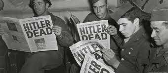 Adolf Hitler commits suicide