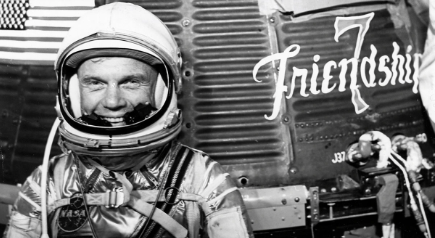 First man to orbit earth by USA