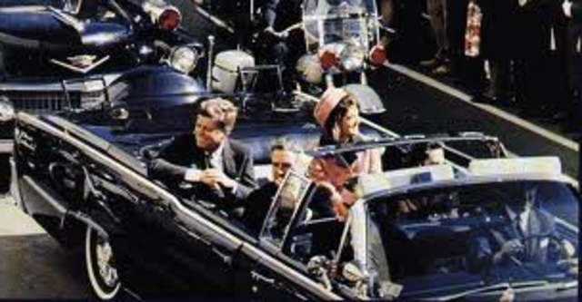 John Fitzgerald Kennedy is fatally shot in the head