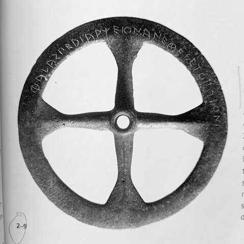 Roda votiva arcaica grega (ca. 525 aC)