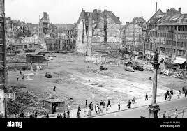 Hitler moves to Munich