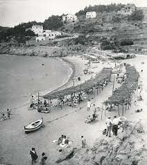 Playa entre Tossa de Mar y la Punta Prima, junto al puerto de Sant Feliu de Guíxols,