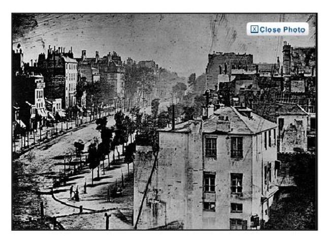 The first photo of a person