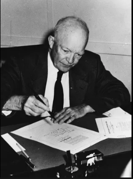 Eisenhower signs the Civil Rights Act