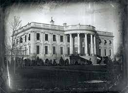 John Adams moves into the White House