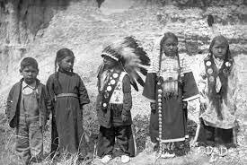 Congress decides it's illegal for Native Americans to be taught in their native language