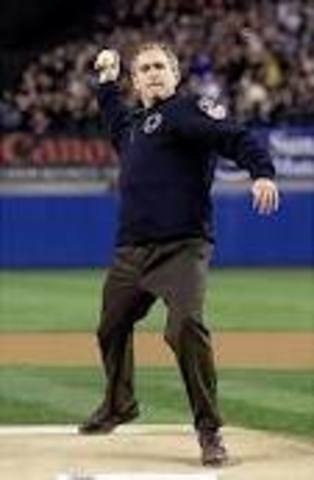 October 30, just weeks after the terrorist attacks of September 11, President George W. Bush throws out the first ball of the third game of the World Series in New York's Yankee Stadium.