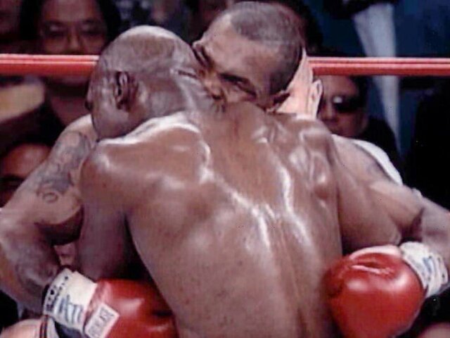 Tyson bites Holyfield