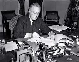 Lend-Lease act signed into law