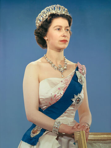 Knighted by Queen Elizabeth II