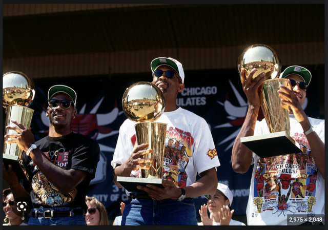 Michael Jordan wins three peat