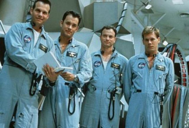 During Apollo 13 an oxygen tank explodes. With help from mission control, the crew returns safely to earth.