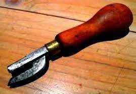 Ezra Warner invents the can opener.