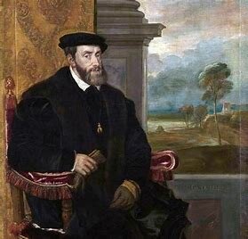 Título de su ciudad y Carlos V
