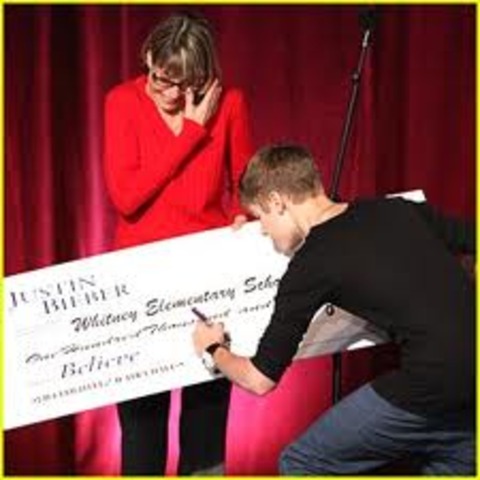 Justin bieber visits needy school