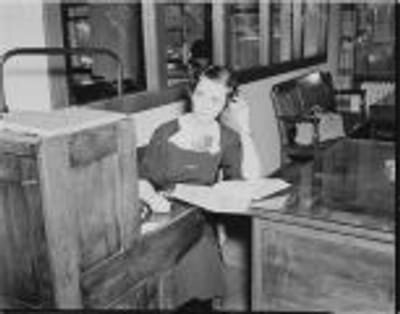 Mrs. Gladys Coy, information receptionist and switchboard operator