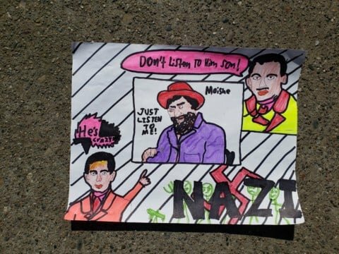 Moishe returns to Sighet to tell the Jews what he saw