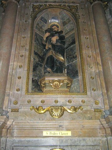 San Pedro abrazando a un esclavo negro