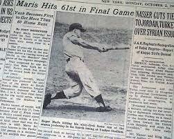 Roger Maris of the Yankees breaks Babe Ruth's single season home run record