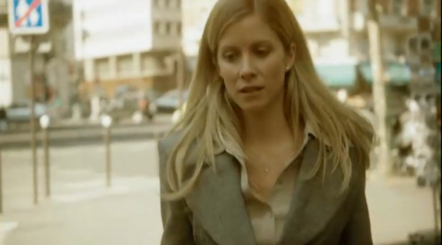 shows character in a shop then walking away, followed by a man whos identity is not shown who then murders her