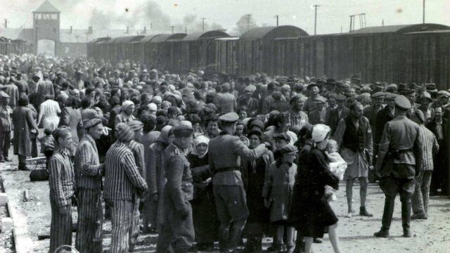 First prisoners arrive at Auschwitz