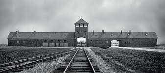 First prisoners arrive at Auschwitz