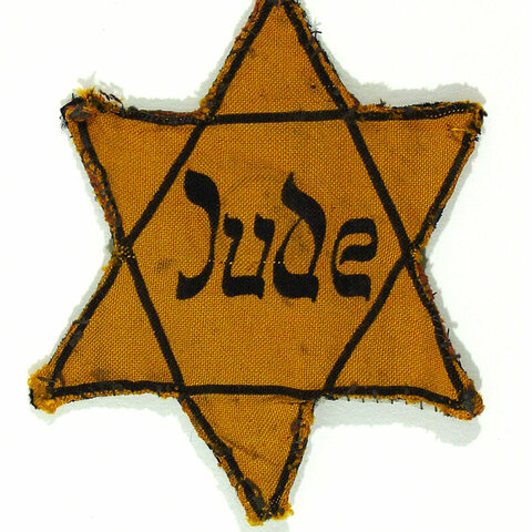 Jewish badge, mandatory for Jewish population.