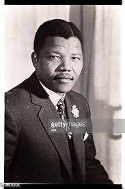 Mandela is posing