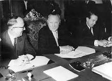 West Germany joins NATO and begins rearmament