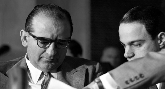 McCarthy claims that communists have infiltrated the CIA and atomic weapons industry