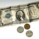 Dollar bill and small change
