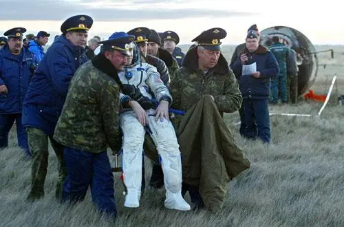 Returning from the Soyuz TM-13 mission