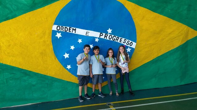 Ganhei uma medalha na Olimpíada de matemática.