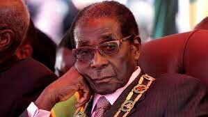 President Mugabe of Zimbabwe blames the UK for the cholera outbreak in his country, thus making the UK a scapegoat for the problems being faced in his country.