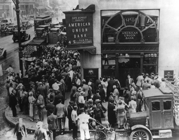 photograph of a crowd at New York's American Union Bank during a bank run early in the Great Depression.