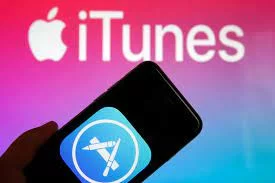 When did Apple launch iTunes ?