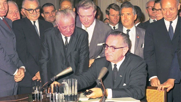 President Johnson signs Civil Rights Act of 1964