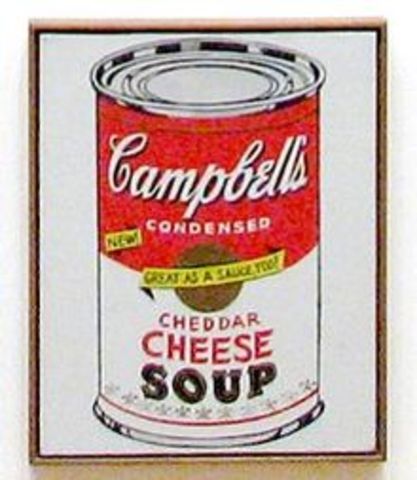 Andy Warhol exhibits his Campbell's soup cans art