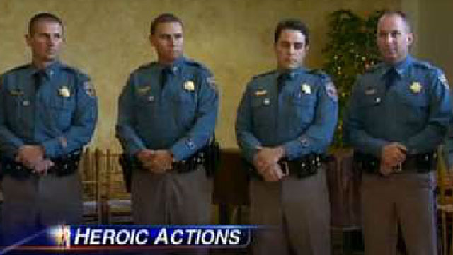 Work crew, troopers, police honored for roles in capture of Dougherty gang