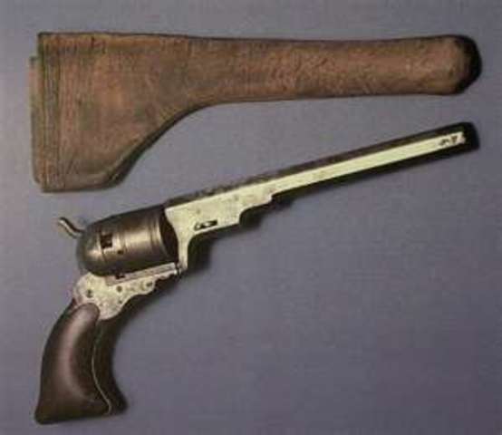 Samuel Colt manufactured the 1st pistol, a 34-caliber "Texas" model.