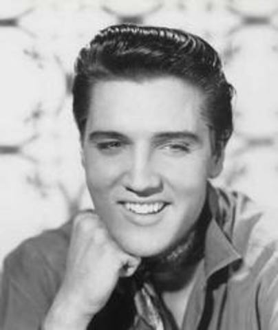 Elvis Presley signs to RCA records beginnign his pop career