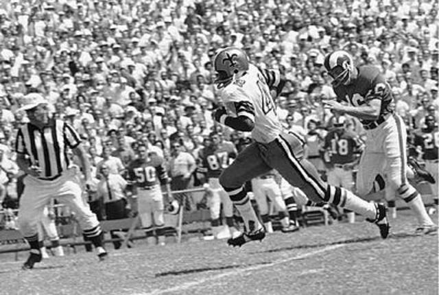 Saints take the field for the first time.