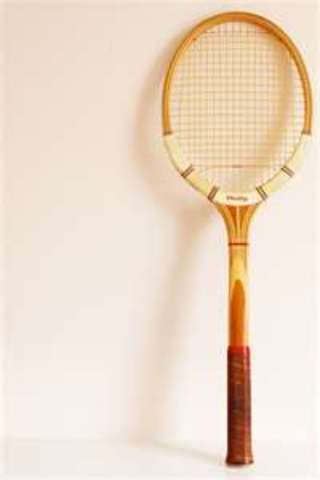 Wooden racquets were used.