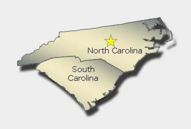Carolinas were split into the North and South .