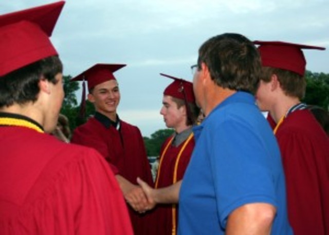 Applaud son for graduating high school.