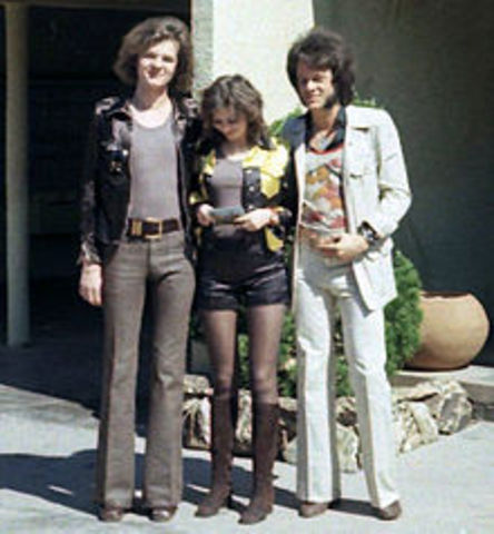 Mini skirts, Leather, Bobby socks, bell bottoms, hippie headbands