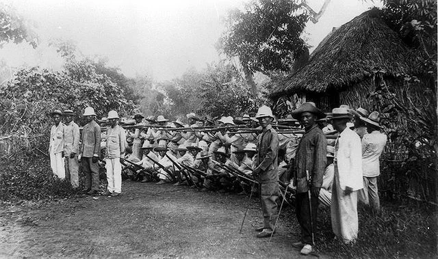 15th April: Philippine-American War: Filipinos Filipino guerrillas launch a suprise attack on U.S. infantry and begin a Siege Catubig four-day seige of Catubig, Northern Samar Catubig, Philipines.